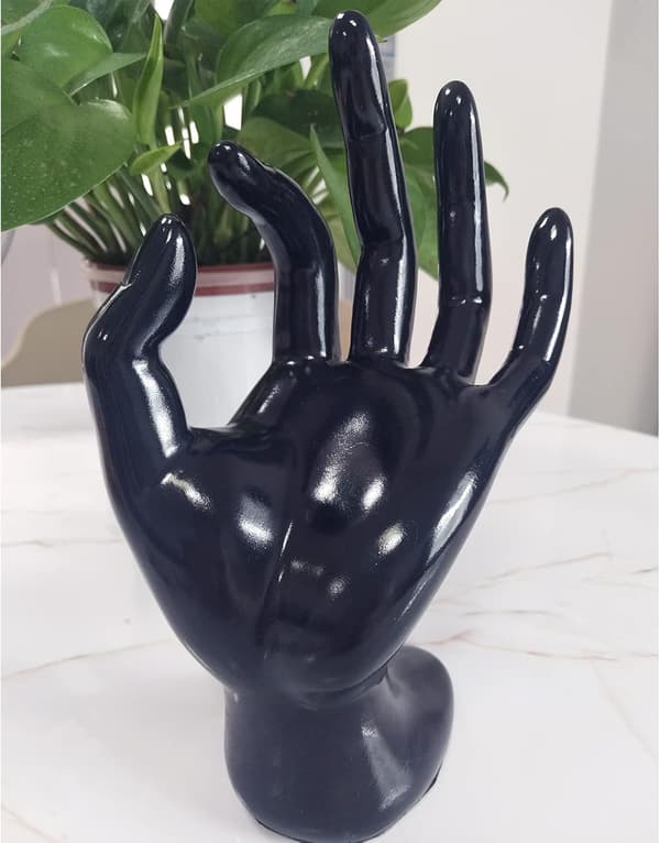 Smykkestativ til ringe, øreringe, armbånd og halskæder. Sort, håndformet design.