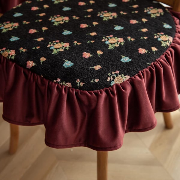 Svart stolpute med vintage trykt blonde