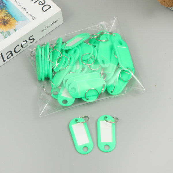 Blå pakke med 50 tag nøkkelringer, 4,7 x 2 cm plast tag nøkkelring med
