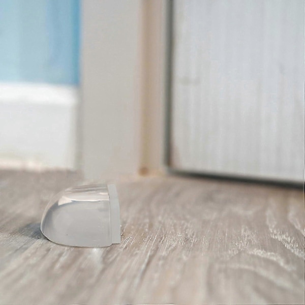 Sett med 2 dørstoppere i gummi - 4,2 x 2,2 x 3,8 cm (B x H x D) - Selvklebende, luktfri, transparent