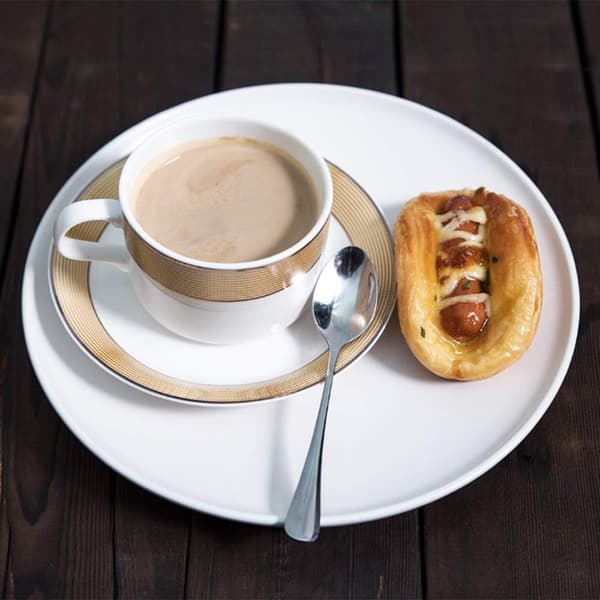 Sett med 12 små ovale kaffeskjeer i rustfritt stål 10,5 cm