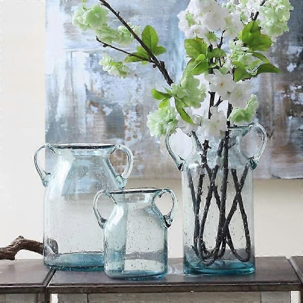 Elegant dubbelörad glasvas med luftbubblor i blåaktig färg för bordsdekoration