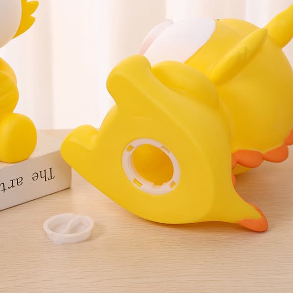 Kreativ tegneseriefigur, gult sparegris, smilende