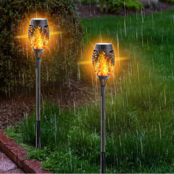 4-pak udendørs solcellelampe med flammeeffekt
