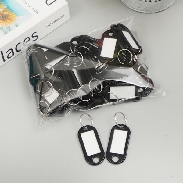 Blå pakke med 50 tag nøkkelringer, 4,7 x 2 cm plast tag nøkkelring med