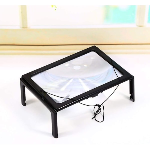 ##/Forstørrelsesglass, leselup for eldre med lys##/
