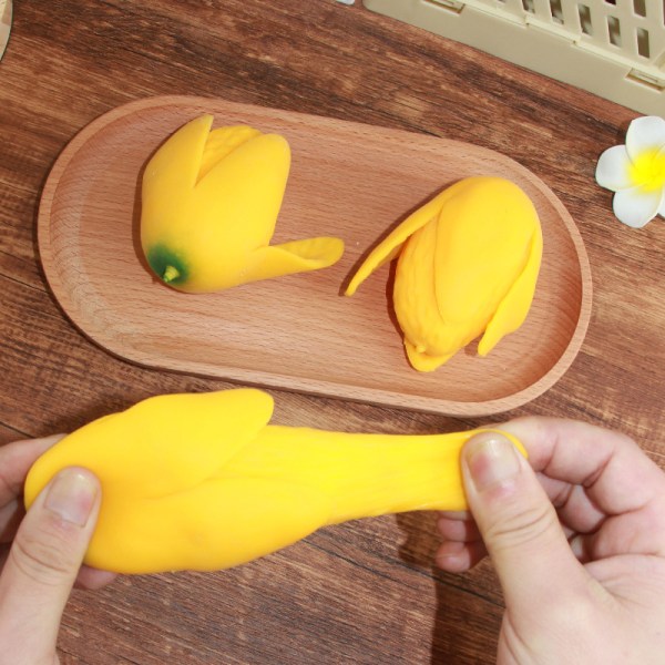 Imitation skrællet mango langsom rebound afstressende legetøj