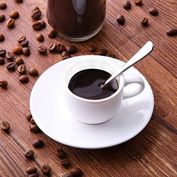 Sett med 12 små ovale kaffeskjeer i rustfritt stål 10,5 cm