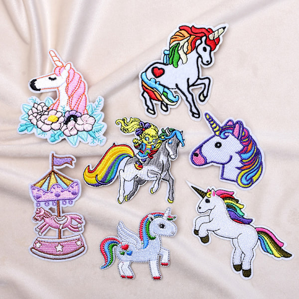 /#/Pakke med 7 børns stryge-på broderi patches/#/