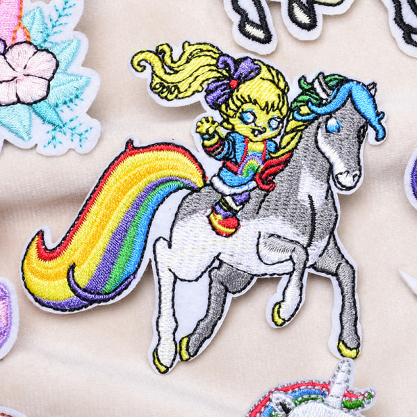 /#/Pakke med 7 børns stryge-på broderi patches/#/