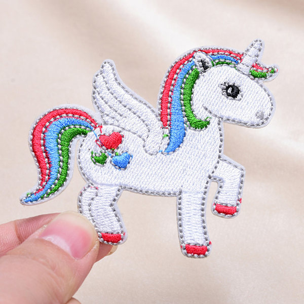 /#/Pakke med 7 børns stryge-på broderi patches/#/