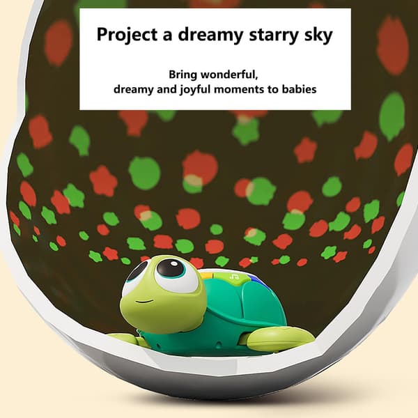 Krypende babyleke med stjerneprojeksjon og musikk