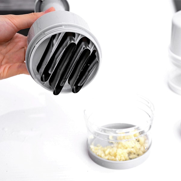 1-pack rostfritt stål handpressad grönsakskutter, multifunktionell kökshackare för ingefära och vitlök, lökhackare och grönsaksrivare