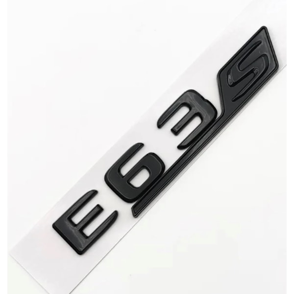 Bilstavbokstaver for E63 Gloss Black logo bagasjelapp