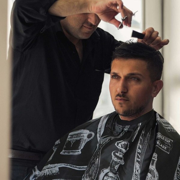 Svart frisørkappe for voksne med mønstre for frisørsalonger, perfekt for klipping, farging, highlighting, etc. 120140cm