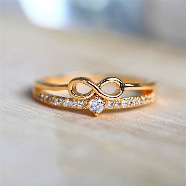 Guld Dainty Bow Ring sæt med runde udskårne uendelige elementer Zirconia