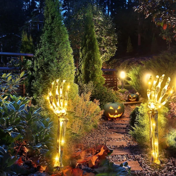 2 stk Halloween falske opplyste skjelettarm staker lys glødende skallehender