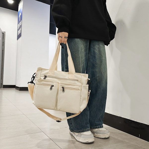 Naisten suurikokoinen kangaskassi, jossa on taskut, crossbody-laukku urheiluun (valkoinen)