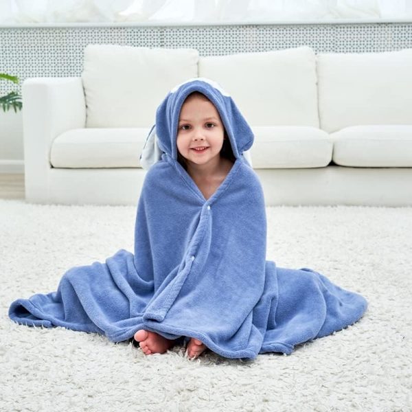 Mjuk barnponcho i korallfleece