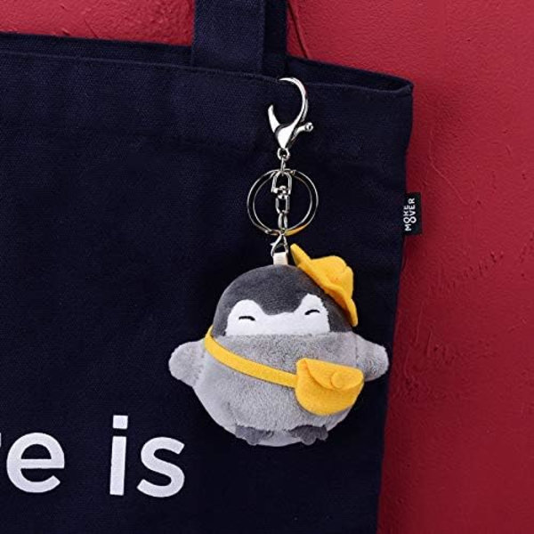 Eläinpehmoleluavainperä Söpö pingviinipehmolelu ja mielenkiintoinen reppu