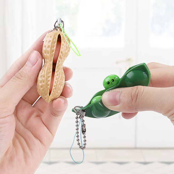 8 stk morsomme ansiktsuttrykk Squeeze Bean Fidget Toy, gave til barn og voksne for å frigjøre stress og angst, Pea Soybean Stress Relief Keychain Pendants (4 nøtter, 4 bønner)