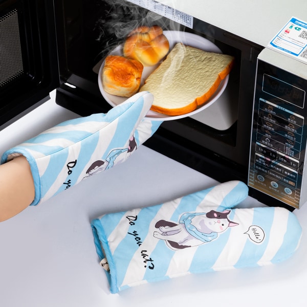Une paire de gants anti-brûlure allongés og coton de cuisine Gant