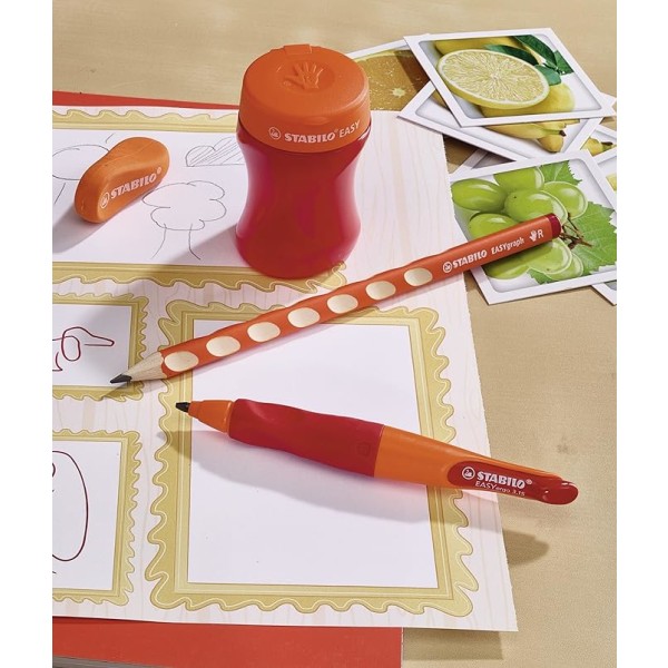 Ergonominen kynän teroitin - oranssi - pesualtaalla - oikea käsi