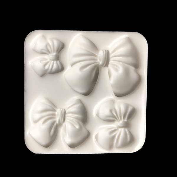 1 stk SLØYFEBÅNDSLØKKE Silikonfondantform Kakeform Sjokolade Ca