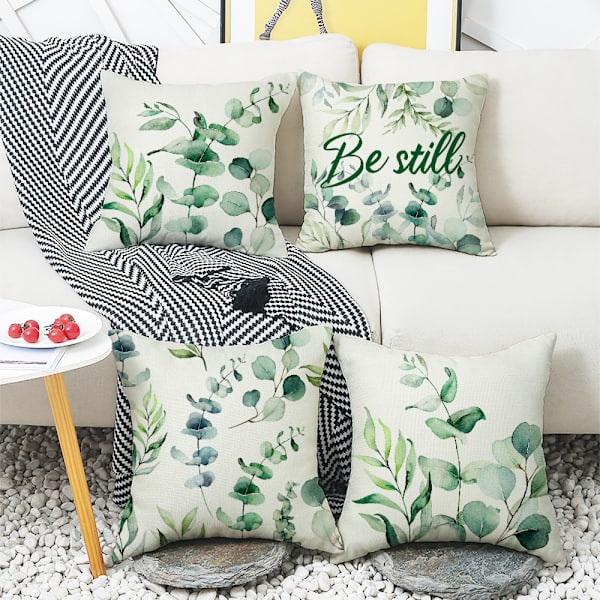 Set med 4 stycken kuddfodral med gröna växter och bladmönster 45 x 45