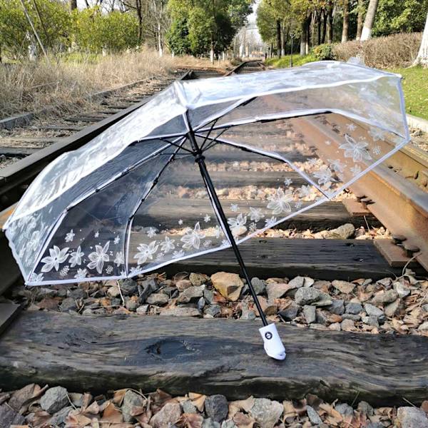 1-pack transparent paraply för kvinnor, blommig, hopfällbar, vit, student, kreativ, automatisk, transparent paraply, dekorativ fotopose, förhindrar att paraplyet täcker ansiktet