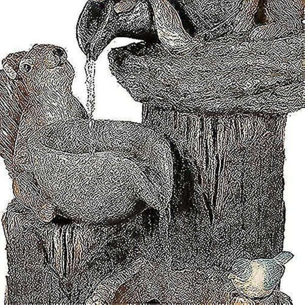 Knickknack-staty av harts i trädgårdspark av konstharts