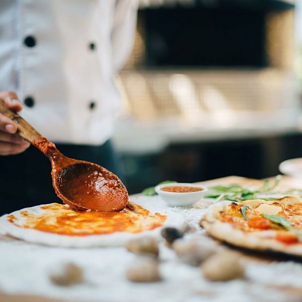 Sæt med 4 runde, perforerede non-stick pizzaplader i stål