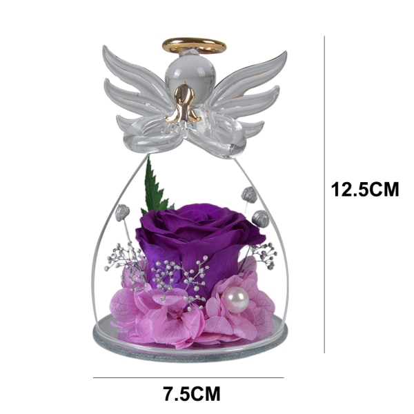 artificial flowers in the glass cover of angel sculpture