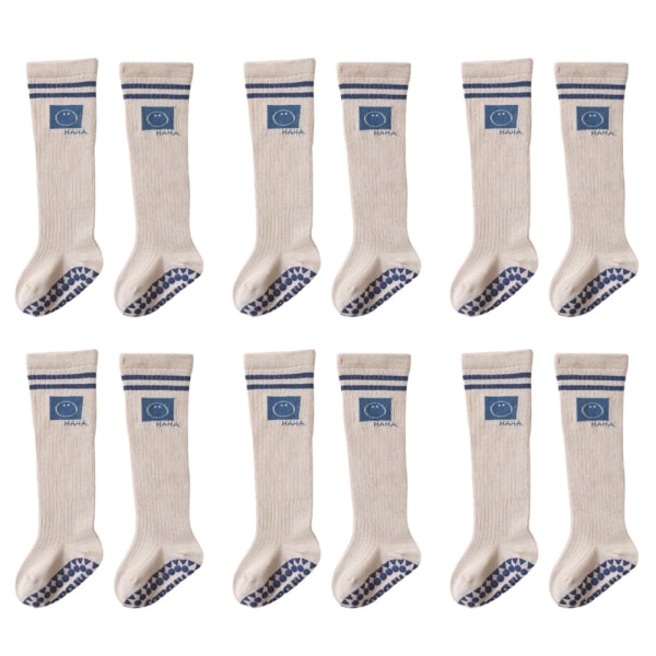 6 Par drenge og piger kan bære skridsikre sokker med stribede sokker
