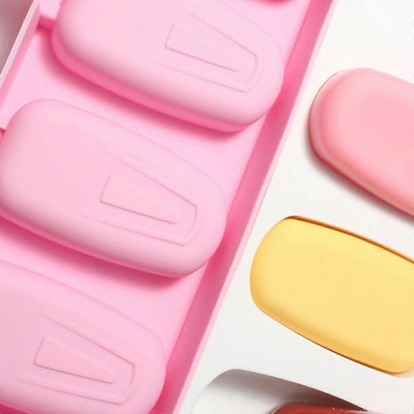 2 stk. isform – rosa isform med lokk og trepinne A