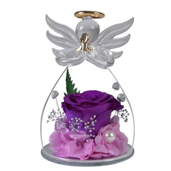 kunstige blomster i glassdekselet til engleskulptur