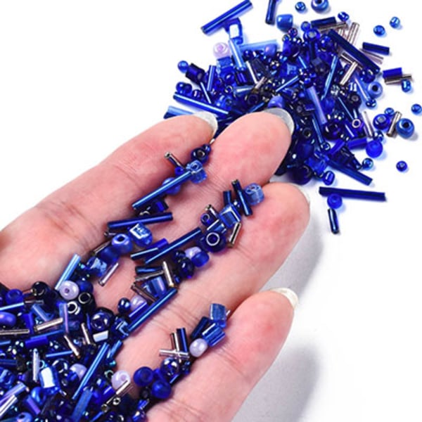 Mix av seed beads och stavpärlor, mörkblå, 20g blå