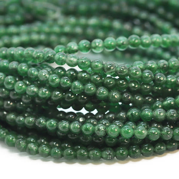 Små runda pärlor av naturlig, tonad "candy jade", ca 3.2mm, aven grön