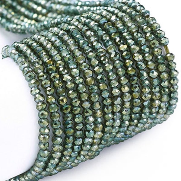 SMÅ fasetterade glasrondeller, 2x1.5mm, metallic blågröna, ca 21 grön