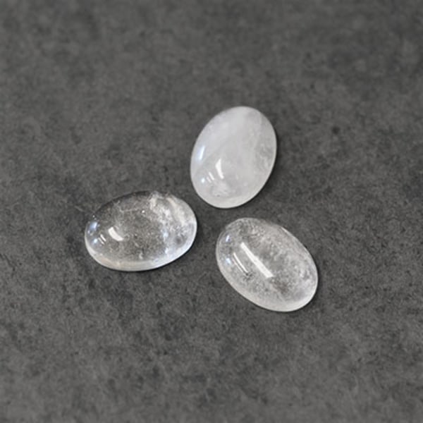 Cabochon, naturlig kvarts/bergkristall, 13x18mm oval, 1st transparent