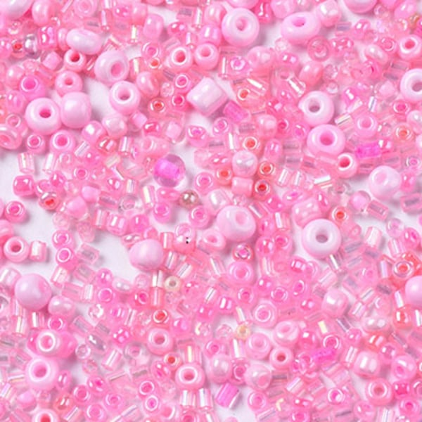 Mix av seed beads och stavpärlor, rosa, 20g rosa