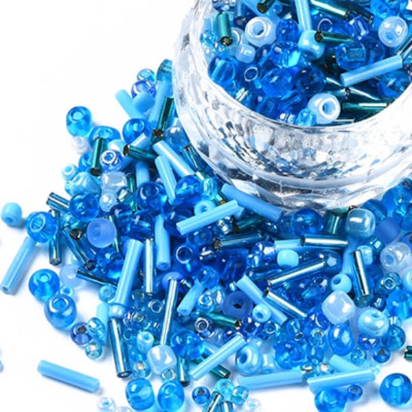 Mix av seed beads och stavpärlor, ljusblå, 20g blå