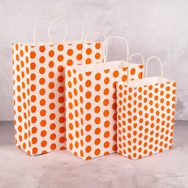 Tryckta presentpåsar med handtag, presentpapper i olika färger