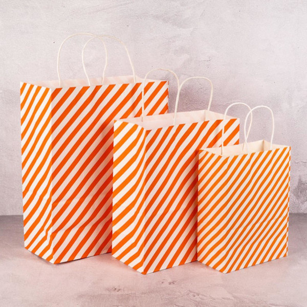 Tryckta presentpåsar med handtag, presentpapper i olika färger