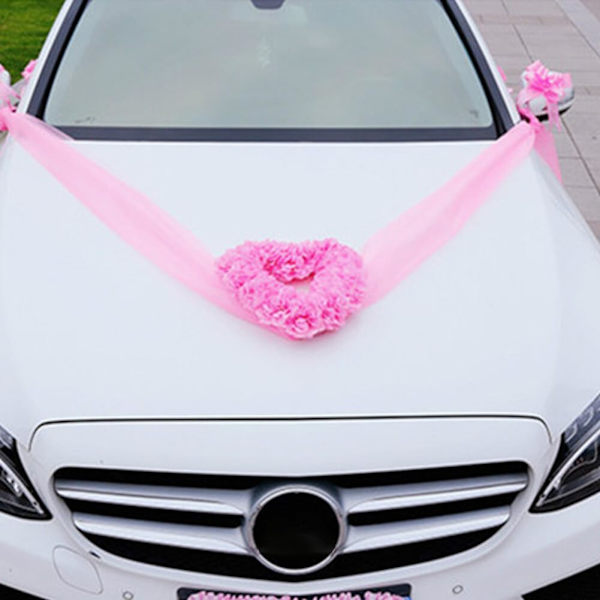 Elegant bryllupsbil dekorationer - Bonnet og rose guirlande til par