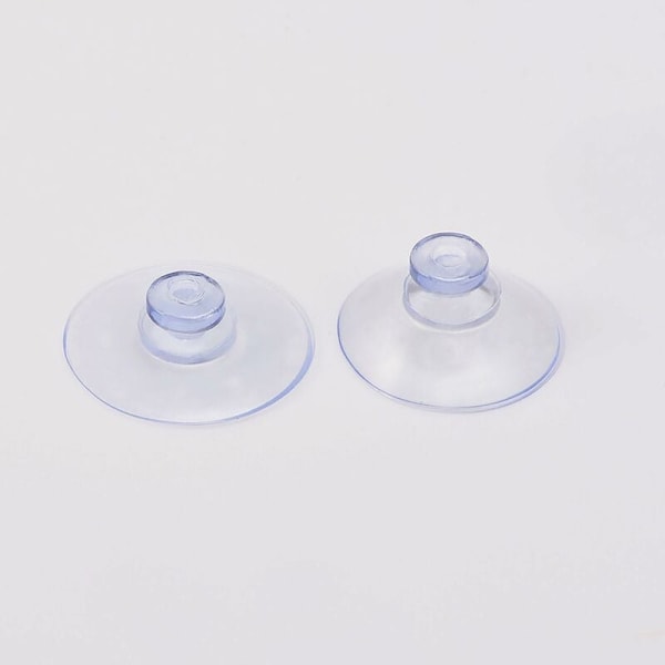 Förpackning med 20 små transparenta sugproppar i plast, utan krok, 20 mm