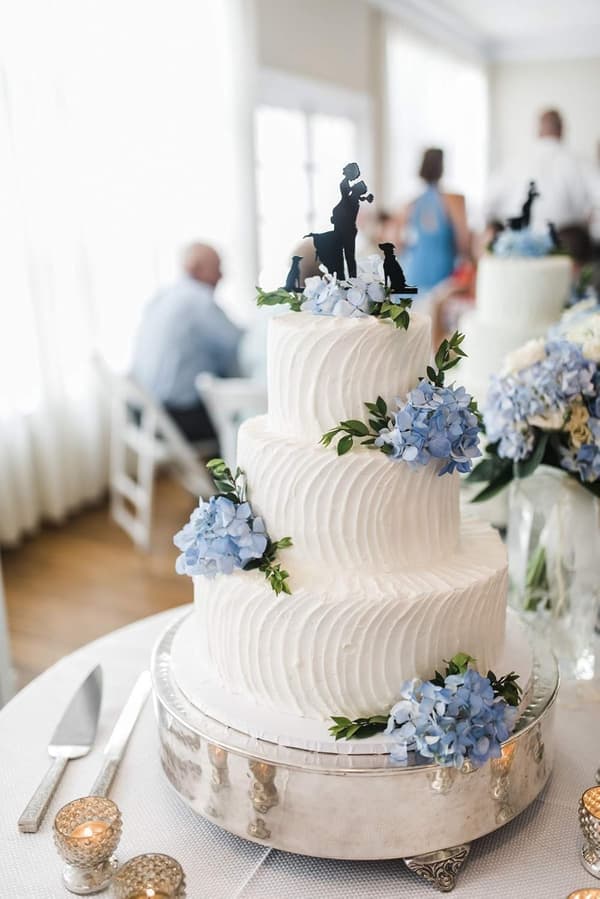 Et sett med 10 kunstige broderte silkeblomsterhoder med bl