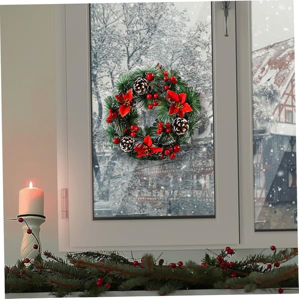 Julekrans, julepynt for å skape en festlig atmosfære—tre røde blomster