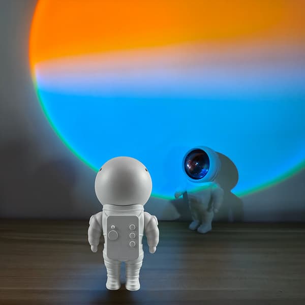Astronautin auringonlaskulamppu laskeutuva auringonlaskulamppu RGB-tausta tunnelma