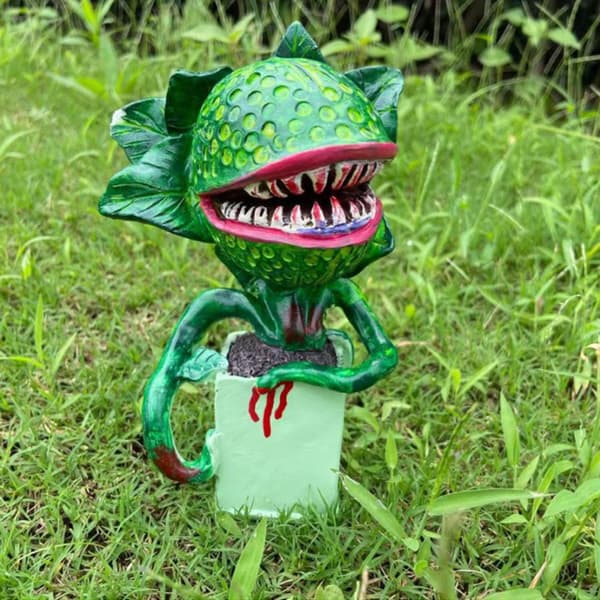Piranha blomsterhave harpiks ornament